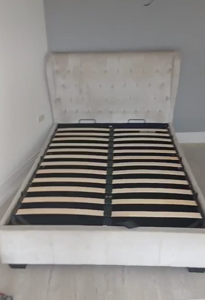 Double bed being carefully moved during a house removal in Windsor, Berkshire by a professional Sandy Movers team